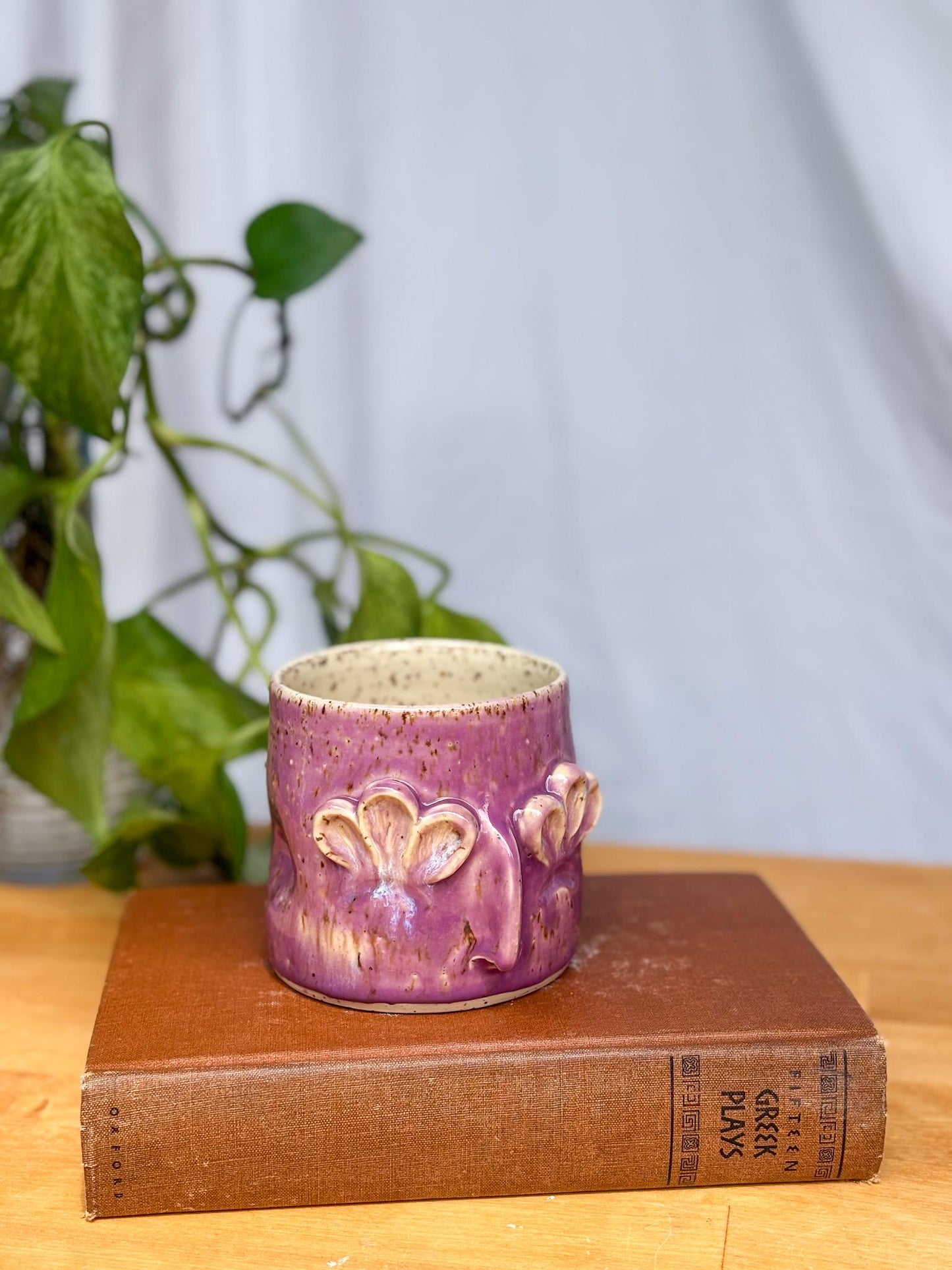 Whimsical Floral Face Mug – Handmade Purple Ceramic Cup with Sculpted Petal Eyes & Nose – Unique Pottery Gift
