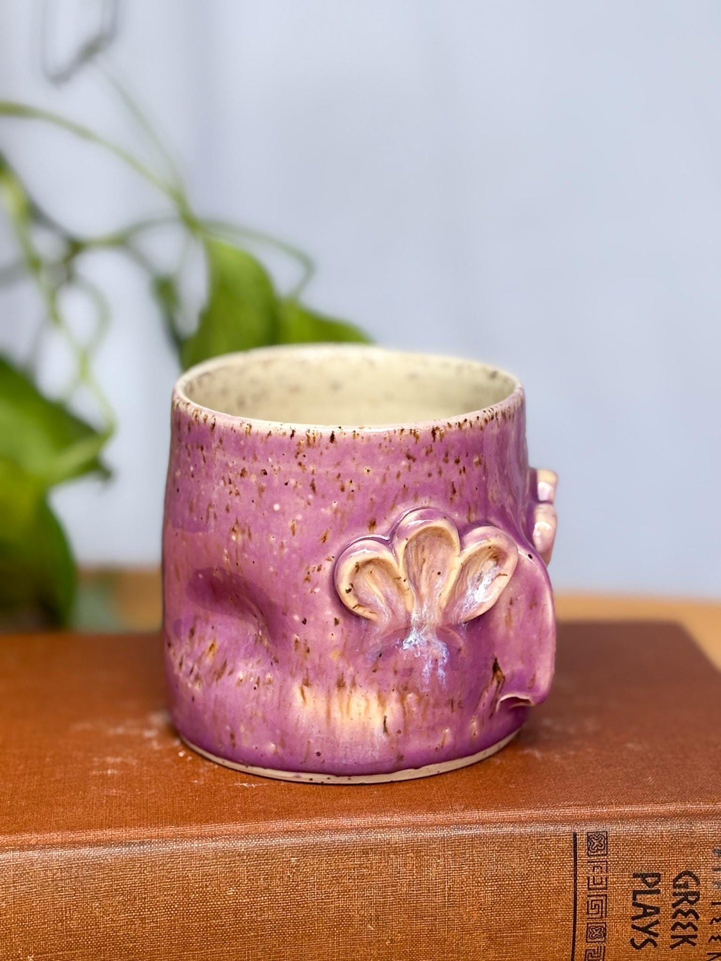 Whimsical Floral Face Mug – Handmade Purple Ceramic Cup with Sculpted Petal Eyes & Nose – Unique Pottery Gift