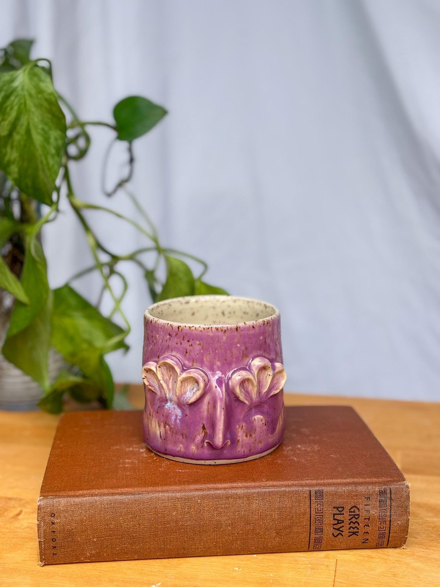 Whimsical Floral Face Mug – Handmade Purple Ceramic Cup with Sculpted Petal Eyes & Nose – Unique Pottery Gift